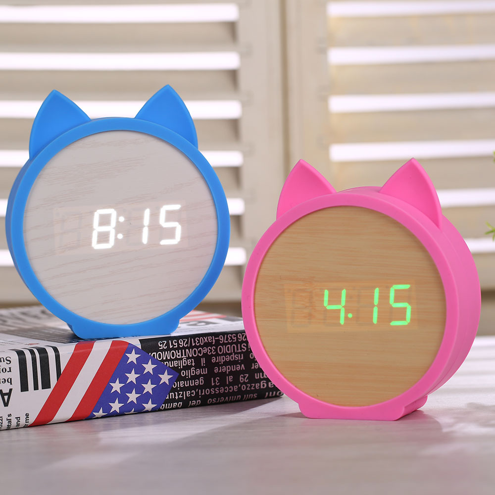 创意猫咪新款卡通儿童环保硅胶木质无声最新款LED电子闹钟